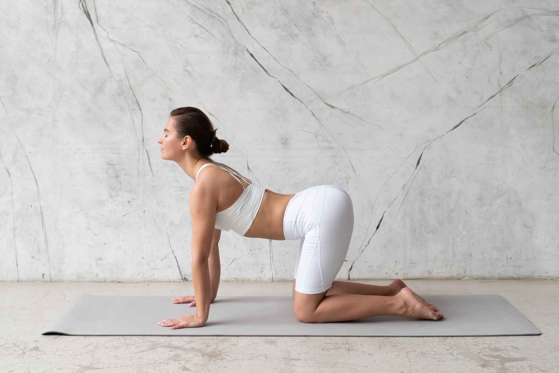 postura Marjaryasana-Bitilasana